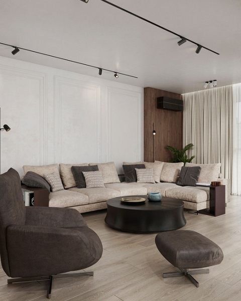 Мінімалізм та бежевий Сучасний бежевий диван з дерев'яними ніжками в мінімалістичному інтер'єрі