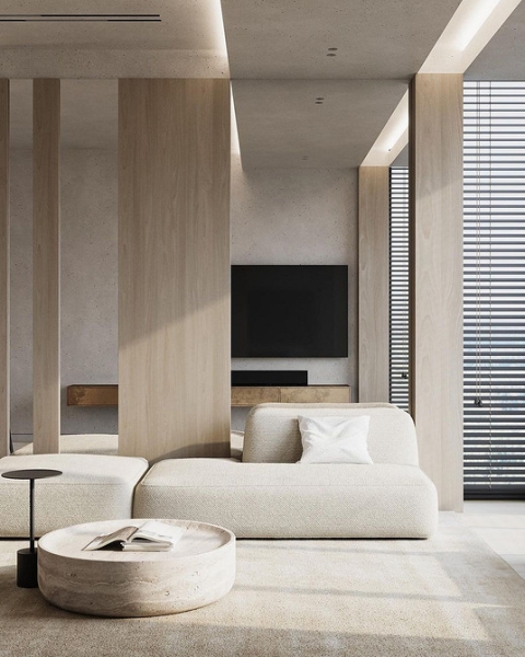 Бежевий диван у сканди-стилі Бежевий диван з дерев'яними ніжками в скандинавському стилі інтер'єру