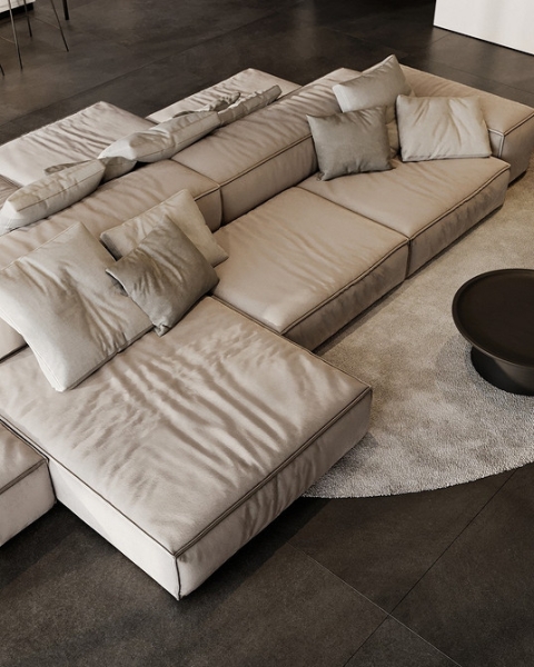 Вітальня з бежевим диваном Інтер'єр вітальні з бежевим диваном, журнальним столиком та килимом