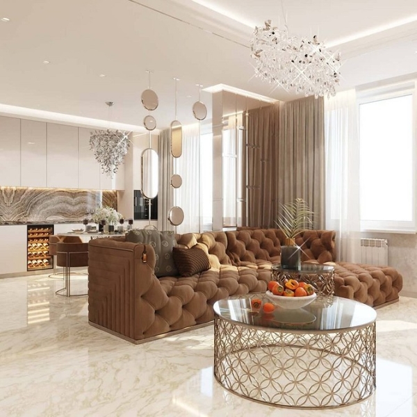 Коричневий диван: мінімалізм Коричневий диван у поєднанні з нейтральними відтінками стін і подушок, стильний мінімалізм.