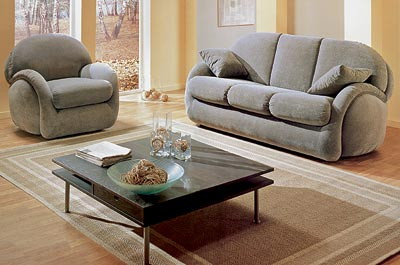 Диван і крісла: затишок Затишний інтер'єр вітальні: м'який кутовий диван та крісла для відпочинку.