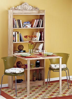 Стіл-стелаж: економія простору Стелаж з письмовим столом своїми руками у вигляді відкритої книги для економії простору.