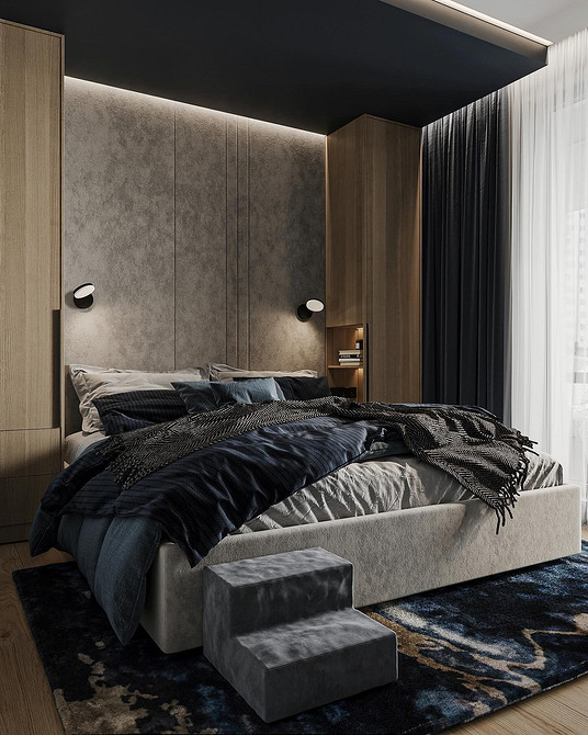 Інтимна сіра спальня Спальня з сірим ліжком, тумбочками та акцентним освітленням для інтимної атмосфери.